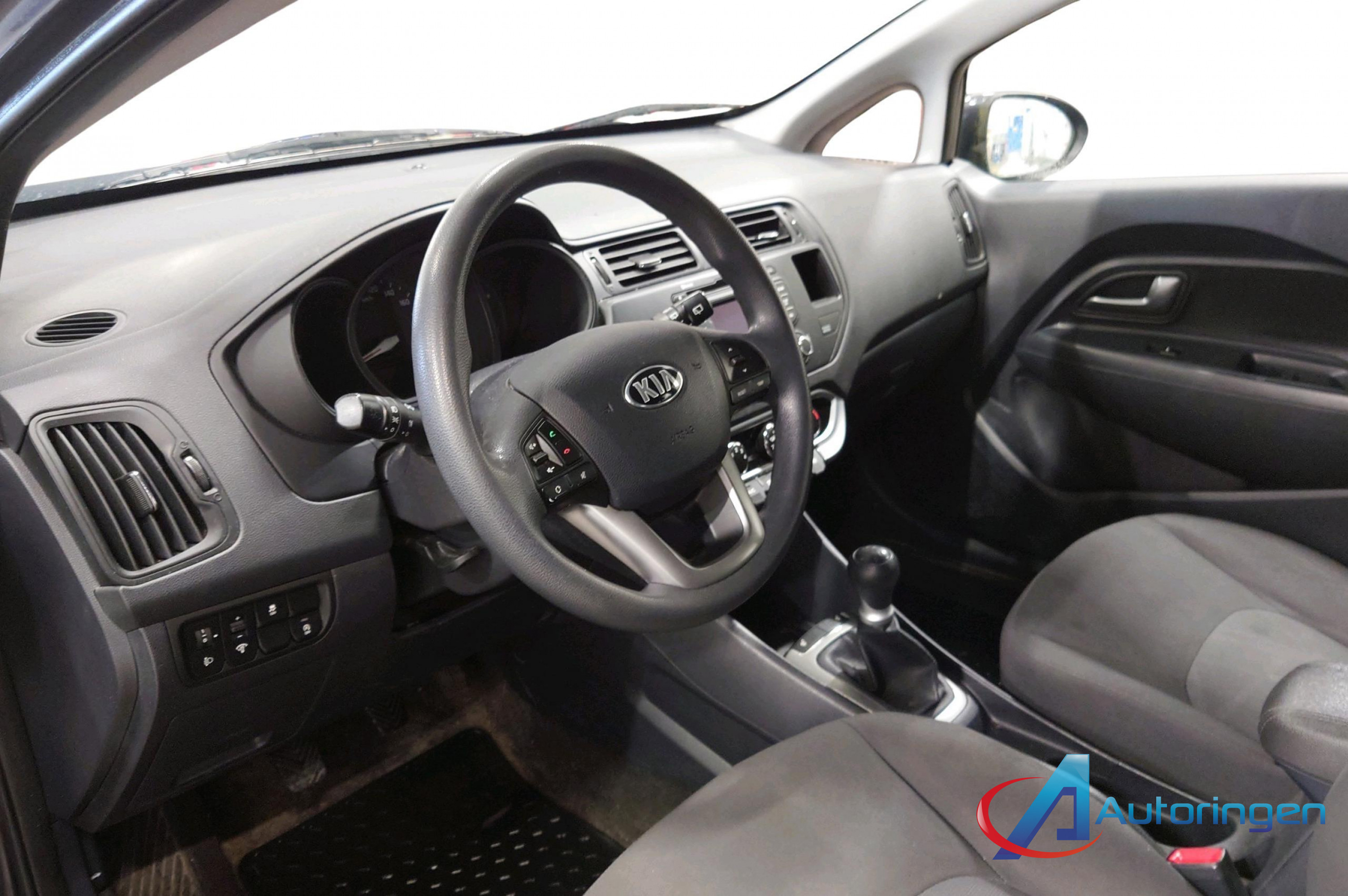 Kia Rio 2014, бензин — фото 11 из 23